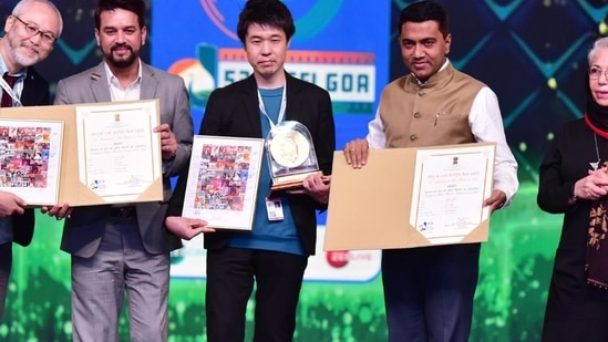 Director Masakazu Kaneko and Executive Producer of ‘Ring Wandering’ receiving the coveted ‘Golden Peacock’ Award for the ‘Best Film’during the closing ceremony of the 52nd International Film Festival of India (IFFI-2021), in Goa on Sunday. (PTI)
