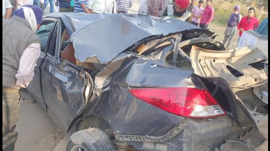 The mangled remains of the car in front of Chandigarh University in Gharuan, Mohali, on Sunday afternoon. (HT Photo)
