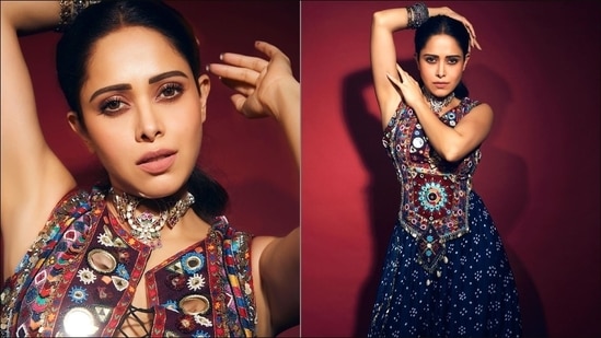 Chhorii star Nushrratt Bharuccha recently treated the Internet with sultry pictures from her latest photoshoot and fans could not keep calm as she cut a sensuous style in an indigo blue draped dhoti skirt set.(Instagram/nushrrattbharuccha)