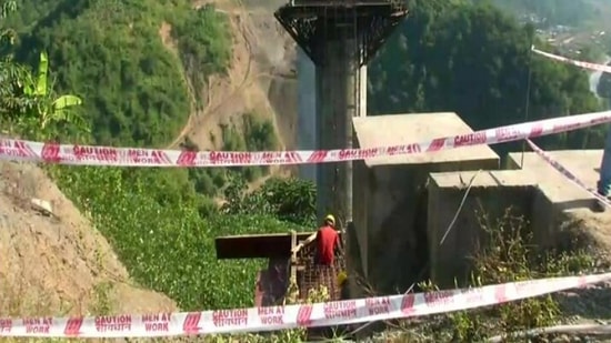 Workers at the construction site of Jiribam-Imphal railway project in Imphal, Manipur.(ANI)