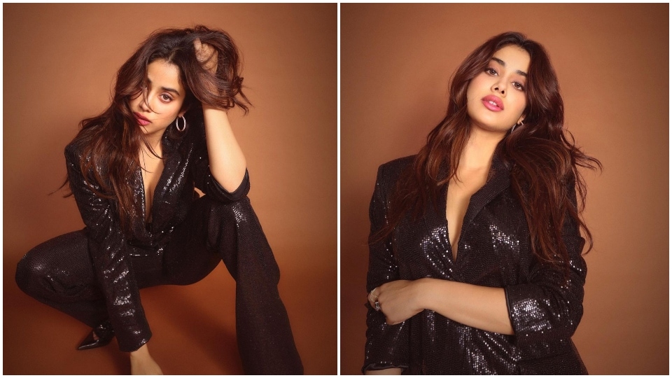 Janhvi Kapoor in a black sequinned powersuit.&nbsp;