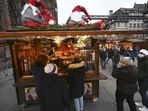 A stall tenant serves mulled wine on the opening day of the traditional Christmas market in Strasbourg, eastern France.(Frederick Florin/ AFP) A stall tenant serves mulled wine on the opening day of the traditional Christmas market in Strasbourg, eastern France.(Frederick Florin/ AFP)