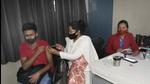 A man gets a dose of Covid-19 vaccine at a Ghaziabad hospital on Monday. (Sakib Ali/HT) A man gets a dose of Covid-19 vaccine at a Ghaziabad hospital on Monday. (Sakib Ali/HT)