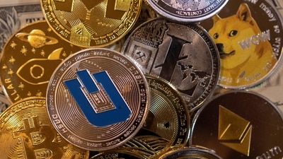 The news of the Covid-19 variant affected world markets along with cryptocurrencies but the Omicron coin remained resilient (REUTERS)