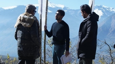 Ranbir Kapoor and Amitabh Bachchan with Brahmastra director Ayan Mukerji. Ranbir Kapoor and Amitabh Bachchan with Brahmastra director Ayan Mukerji.