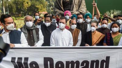 Congress president Sonia Gandhi, party leader Rahul Gandhi and others stage a protest demanding repeal of Centre's three farm laws, at Parliament House ahead of the Winter Session, in New Delhi on Monday. (PTI) Congress president Sonia Gandhi, party leader Rahul Gandhi and others stage a protest demanding repeal of Centre's three farm laws, at Parliament House ahead of the Winter Session, in New Delhi on Monday. (PTI)