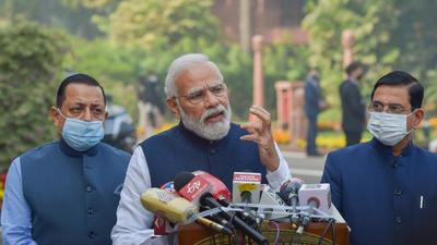 Prime Minister Narendra Modi addresses media as he arrives at Parliament to attend the winter session, in New Delhi, on Monday. “The government is ready to discuss all issues but the dignity of Parliament should be upheld,” he said. (PTI) Prime Minister Narendra Modi addresses media as he arrives at Parliament to attend the winter session, in New Delhi, on Monday. “The government is ready to discuss all issues but the dignity of Parliament should be upheld,” he said. (PTI)