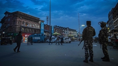 An security personnel stands guard along a street in Srinagar. (AFP) An security personnel stands guard along a street in Srinagar. (AFP)