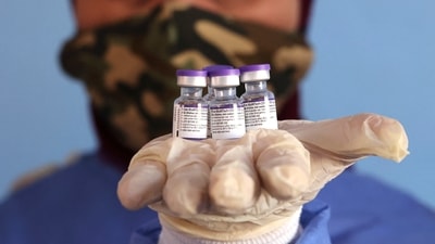 Pfizer CEO Albert Bourla told CNBC that his company on Friday began testing the current vaccine against the Omicron variant. (AFP) Pfizer CEO Albert Bourla told CNBC that his company on Friday began testing the current vaccine against the Omicron variant. (AFP)