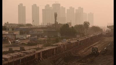 A thick layer of smog engulfed the city on Monday morning. (Vipin Kumar/HT PHOTO)