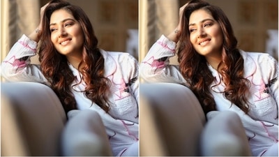 Disha's ensemble features a full sleeve button-down shirt in pristine white shade with short notch lapel collars. The textured top came with contrast pink piping on sleeves and hem, a front patch pocket, and a quirky flamingo print. (Instagram/dishaparmar )