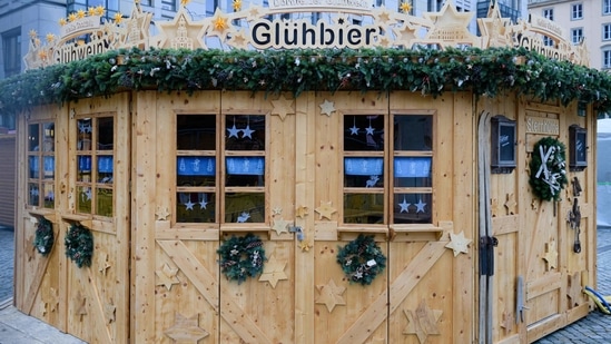 Mulled wine stall serving Christmas 2021 3 1638082287467 1638169067232 A closed mulled wine stall is pictured during the set-up at the Dresdner Striezelmarkt Christmas market in Dresden, eastern Germany. The Striezelmarkt in Dresden, the oldest Christmas market in Germany which draws around three million visitors annually, was cancelled this year due to the pandemic. (Jens Schlueter/ AFP)