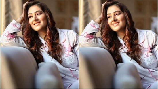 Disha's ensemble features a full sleeve button-down shirt in pristine white shade with short notch lapel collars. The textured top came with contrast pink piping on sleeves and hem, a front patch pocket, and a quirky flamingo print.(Instagram/dishaparmar )
