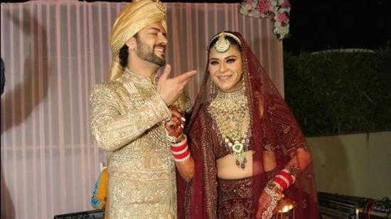 Newlyweds Sanjay Gagnani and Poonam Preet Bhatia at their wedding in Delhi.