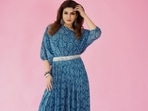 If you are searching for fashion cues to look apart and make a sartorial statement on a cocktail evening, Bollywood diva Raveena Tandon got you sorted with her Indo-western style in a gathered pleated gown.(Instagram/officialraveenatandon)