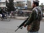 A Taliban fighter stands guard in Kabul, Afghanistan. REUTERS/Ali Khara
