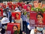 The 76-year-old Suu Kyi has been detained since the generals ousted her government in the early hours of February 1, ending Myanmar's brief democratic interlude. In picture - Protesters hold portraits of Aung San Suu Kyi during an anti-coup demonstration in Mandalay, Myanmar.