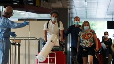 Australian authorities said on Sunday that the two passengers who tested positive on arrival in Sydney were fully vaccinated and had been placed in isolation. (Reuters file photo)