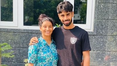 Pritam Rani Siwach with son Yashdeep (Hockey India) Pritam Rani Siwach with son Yashdeep (Hockey India)