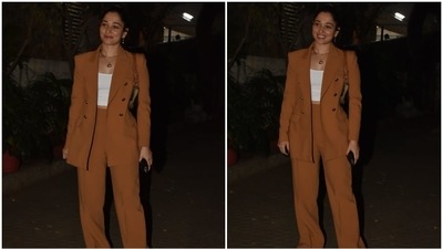 Tamannaah was clicked by paparazzi while enjoying an evening out in the bay. She made a case for monochromatic and minimal looks with her ensemble. Additionally, she nailed boss lady vibes with her choice of outfit - a powersuit. (HT Photo/Varinder Chawla) Tamannaah was clicked by paparazzi while enjoying an evening out in the bay. She made a case for monochromatic and minimal looks with her ensemble. Additionally, she nailed boss lady vibes with her choice of outfit - a powersuit. (HT Photo/Varinder Chawla)