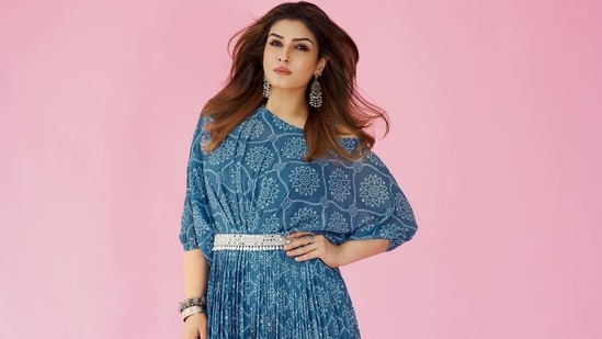 The gown, credited to Indian fashion label Onaya, is ideal for cocktail evenings, and looks best when worn with silver danglers.(Instagram/officialraveenatandon)