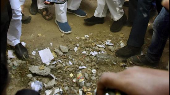 RJD leader Tejashwi Yadav at the spot where empty liquor bottles were found, at Bihar Assembly in Patna on Tuesday. (Santosh Kumar/HT Photo) RJD leader Tejashwi Yadav at the spot where empty liquor bottles were found, at Bihar Assembly in Patna on Tuesday. (Santosh Kumar/HT Photo)