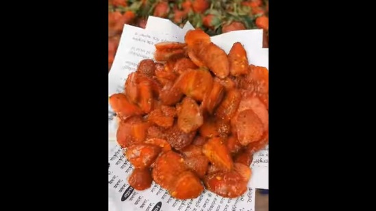 The bizarre strawberry masala after being served on a paper plate. (instagram/@ourcollecti0n) The bizarre strawberry masala after being served on a paper plate. (instagram/@ourcollecti0n)