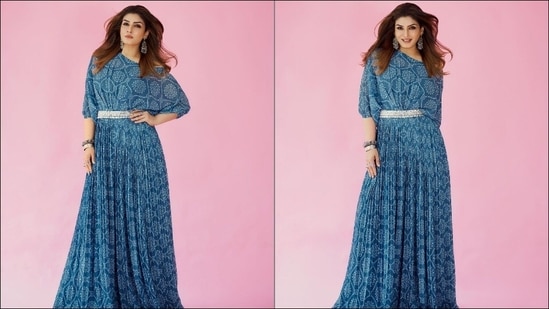 Taking to her social media handle, the diva shared a slew of pictures that showed her donning a printed blue floor-length flared gown that was clenched around the waist with an embellished waistband and sported butterfly sleeves that added to the gathered look.(Instagram/officialraveenatandon)