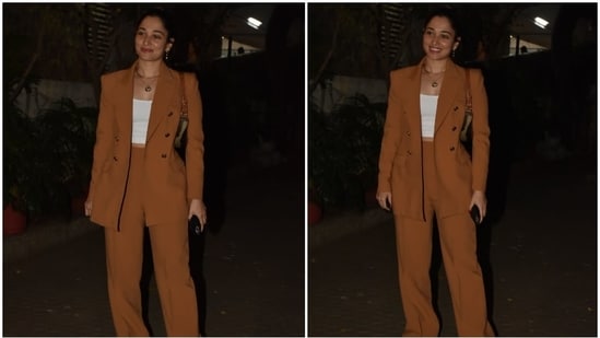 Tamannaah was clicked by paparazzi while enjoying an evening out in the bay. She made a case for monochromatic and minimal looks with her ensemble. Additionally, she nailed boss lady vibes with her choice of outfit - a powersuit.(HT Photo/Varinder Chawla)