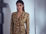Mouni Roy taps into workwear trend of shirtless pantsuit with floral co-ords(Instagram/imouniroy) Mouni Roy taps into workwear trend of shirtless pantsuit with floral co-ords(Instagram/imouniroy)
