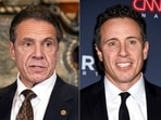 Andrew Cuomo, left, appears during a news conference about COVID-19 at the State Capitol in Albany, New York.