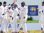 Sri Lankan bowler Ramesh Mendis , third left, celebrates the dismissal of West Indies batsman Shai Hope, right, with his teammates during the day three of their second test cricket match in Galle, Sri Lanka, Wednesday, Dec. 1, 2021. Sri Lankan bowler Ramesh Mendis , third left, celebrates the dismissal of West Indies batsman Shai Hope, right, with his teammates during the day three of their second test cricket match in Galle, Sri Lanka, Wednesday, Dec. 1, 2021.
