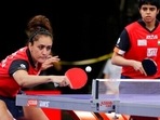 India's Manika Batra, left, returns a volley next to Archan Girish Kamath, right, during a quarterfinals women's doubles match during day five of the 2021 World Table Tennis Championships Saturday, Nov. 27, 2021, in Houston.(AP) India's Manika Batra, left, returns a volley next to Archan Girish Kamath, right, during a quarterfinals women's doubles match during day five of the 2021 World Table Tennis Championships Saturday, Nov. 27, 2021, in Houston.(AP)