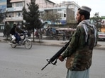 A Taliban fighter stands guard in Kabul, Afghanistan.&nbsp;