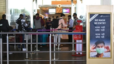 Passengers at the Chhatrapati Shivaji Maharaj International Airport in Mumbai on Wednesday, on the first day of Centre's travel guidelines. (ANI Photo)