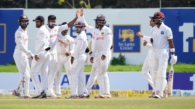 Sri Lankan bowler Ramesh Mendis , third left, celebrates the dismissal of West Indies batsman Shai Hope, right, with his teammates during the day three of their second test cricket match in Galle, Sri Lanka, Wednesday, Dec. 1, 2021. (AP) Sri Lankan bowler Ramesh Mendis , third left, celebrates the dismissal of West Indies batsman Shai Hope, right, with his teammates during the day three of their second test cricket match in Galle, Sri Lanka, Wednesday, Dec. 1, 2021. (AP)