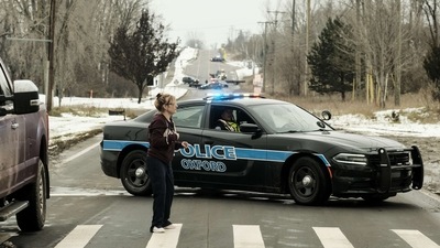 A police road block restricts access to Oxford High School following a shooting in Oxford, Michigan. (AFP)