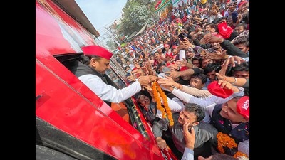 SP chief Akhilesh Yadav greets supporters during a ‘Samajwadi Vijay Yatra’ in Banda on Wednesday. PM Modi, during a rally in Purvanchal on October 21, alleged that the SP has moved away from ‘samajwad’ (socialism) to ‘parivaarwad’ (family-run). (PTI) SP chief Akhilesh Yadav greets supporters during a ‘Samajwadi Vijay Yatra’ in Banda on Wednesday. PM Modi, during a rally in Purvanchal on October 21, alleged that the SP has moved away from ‘samajwad’ (socialism) to ‘parivaarwad’ (family-run). (PTI)
