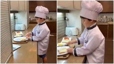 Yash Johar making sandwiches in the kitchen. Yash Johar making sandwiches in the kitchen.
