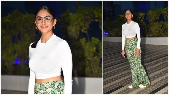 With subtle makeup, Mrunal Thakur parted her sleek hair in the middle and tied a low ponytail.(HT Photo/Varinder Chawla)