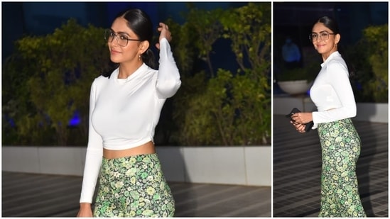 Mrunal Thakur is all smiles at the paparazzi as she poses in her cool yet stylish attire.(HT Photo/Varinder Chawla)