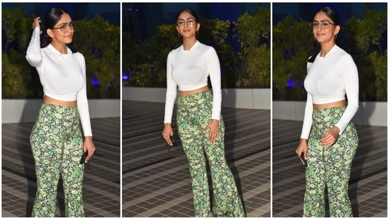 Mrunal Thakur was earlier spotted at producer Murad Khetani’s office in Andheri West donning a white full-sleeve crop top and green floral printed flared pants.(HT Photo/Varinder Chawla)