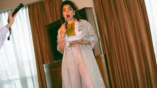 The coat is credited to Indian fashion designer Anavila Misra’s eponymous womenswear label that boasts of Indian ethos, meaningful and sustainable fashion, organic materials to make linens that are soft and comfortable on the body and disrupting the designs to create a completely modern, comfortable and desirable to wear ensembles. The coat originally costs <span class='webrupee'>₹</span>18,600 on the designer website.(Instagram/rashmika_mandanna)