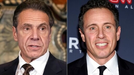 Andrew Cuomo, left, appears during a news conference about COVID-19 at the State Capitol in Albany, New York. (AP)