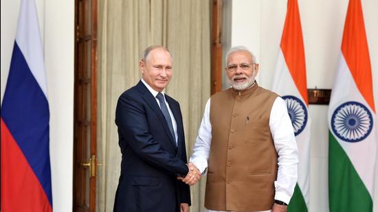 New Delhi, India-October 05, 2018: Prime Minister Narendra Mod(R) shakes hand with Russian President Vladimir Putin (L) before their meeting at Hyderabad House, in New Delhi, India, on Friday, October 05, 2018. (Sonu Mehta / Hindustan Times) (Sonu Mehta/HT PHOTO)