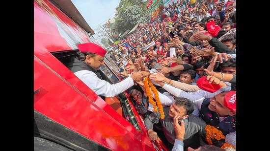 SP chief Akhilesh Yadav greets supporters during a ‘Samajwadi Vijay Yatra’ in Banda on Wednesday. PM Modi, during a rally in Purvanchal on October 21, alleged that the SP has moved away from ‘samajwad’ (socialism) to ‘parivaarwad’ (family-run). (PTI)