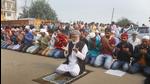 Muslims offer namaz at an open ground while people from the Hindu community perform 'hawan' at the same place nearby, in Gurugram, on November 26. Hindu organisations have opposed the offering of namaz in the open for the last few months. (PTI File) Muslims offer namaz at an open ground while people from the Hindu community perform 'hawan' at the same place nearby, in Gurugram, on November 26. Hindu organisations have opposed the offering of namaz in the open for the last few months. (PTI File)