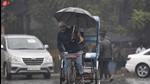 Noida, India - December 02, 2021: Commuters in the drizzling rain at Sector 27 in Noida, India, on Thursday, December 02, 2021. Light drizzling rain resulted in further drop in temperature. (Photo by Sunil Ghosh / Hindustan Times) Noida, India - December 02, 2021: Commuters in the drizzling rain at Sector 27 in Noida, India, on Thursday, December 02, 2021. Light drizzling rain resulted in further drop in temperature. (Photo by Sunil Ghosh / Hindustan Times)