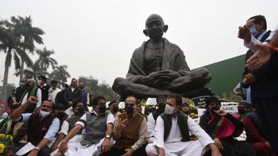 Opposition leaders including Congress MP Rahul Gandhi protested near the Mahatma Gandhi statue demanding the government revoke the suspension of 12 Rajya Sabha members at Parliament in New Delhi. (HT Photo/Arvind Yadav) Opposition leaders including Congress MP Rahul Gandhi protested near the Mahatma Gandhi statue demanding the government revoke the suspension of 12 Rajya Sabha members at Parliament in New Delhi. (HT Photo/Arvind Yadav)