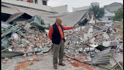Land owner Dhilpreet Singh showing the demolished structure in Ludhiana on Thursday. (HT Photo) Land owner Dhilpreet Singh showing the demolished structure in Ludhiana on Thursday. (HT Photo)